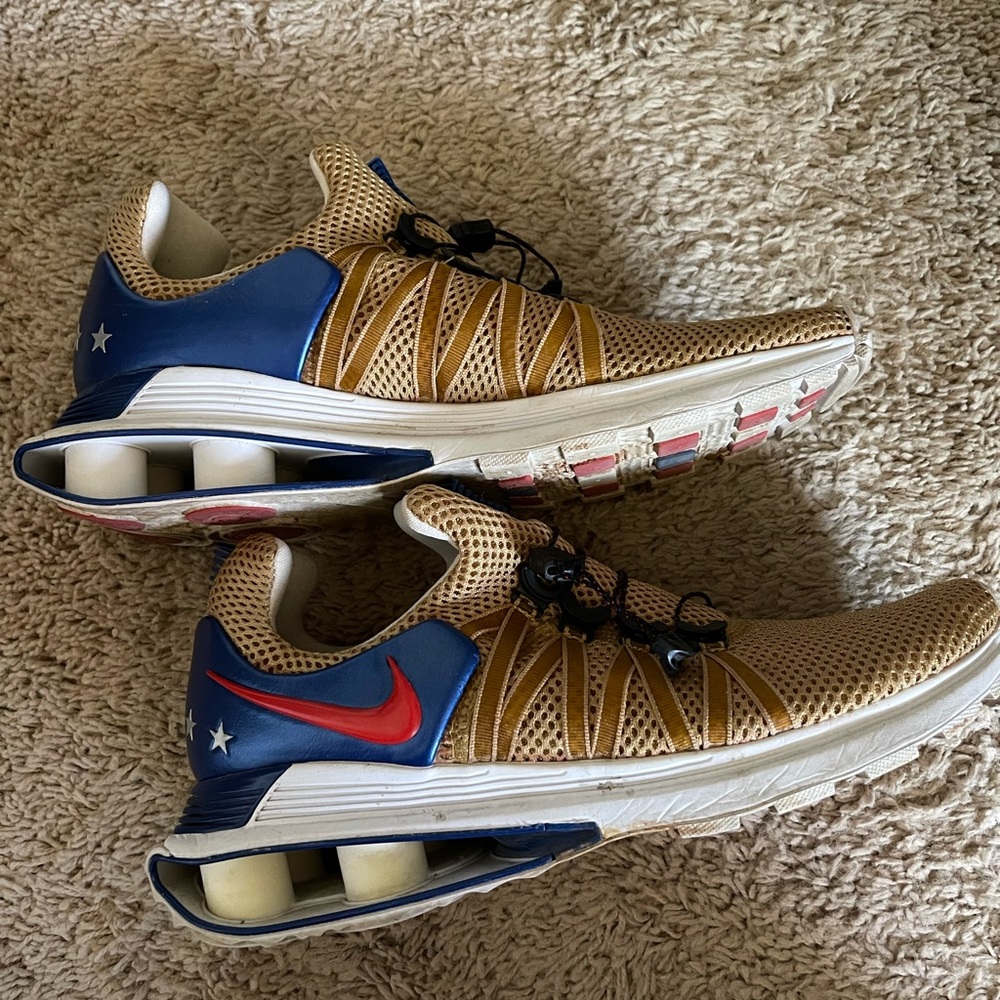 $40 OBO! Nike Shox Running shoes. Gold - USA. Women’s Size 10. Gently used.